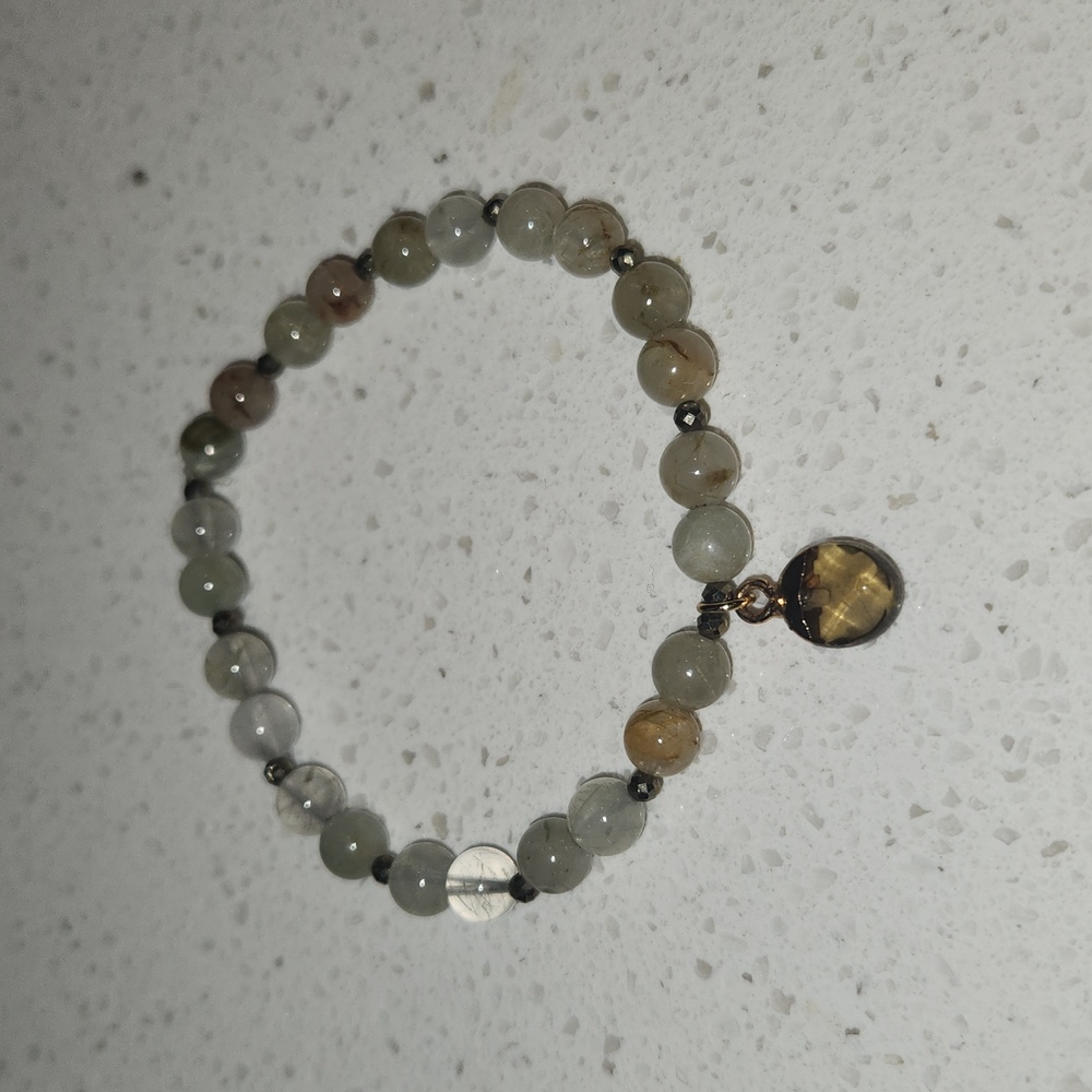 Elegant Beaded Bracelet with Charm